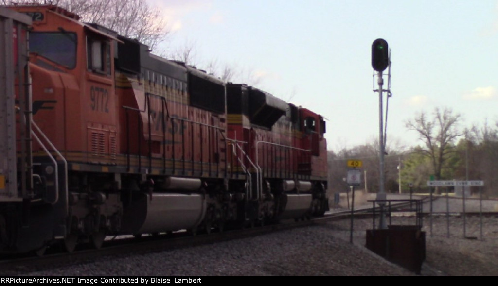 BNSF coal train about to knock down a signal